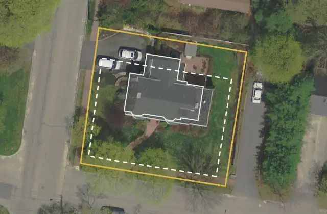 Satellite view of 126 Hersey St: gold parcel boundary, dashed setback envelope, existing home footprint